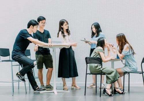 Students gathering in a welcoming environment, engaging in discussion as part of IGEMA's student hosting program.