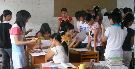 A group of students actively engaging in discussions, exchanging notes, and participating in a collaborative networking session.